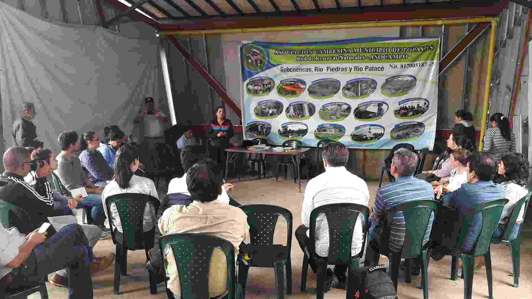 Hub colleagues listening to members of ASOCAMPO (Popayan Municipality Campesino Association Network of Natural Reserves) during a workshop in rural Colombia