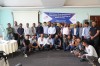 Workshop participants stand and crouch together in two rows in a conference room. The banner behind reads 'Hydrological Data Management and Hydrological Modelling for Water Security' thumbnail