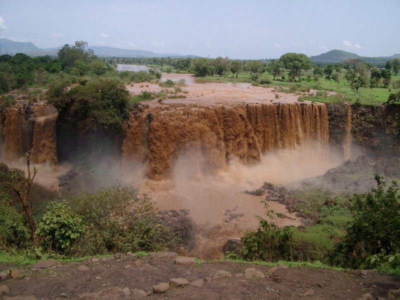 The Abbay River cascades down the Nile Fall during the monsoon season; the water is coloured red from soil and sediment collected along it's fast-flowing path