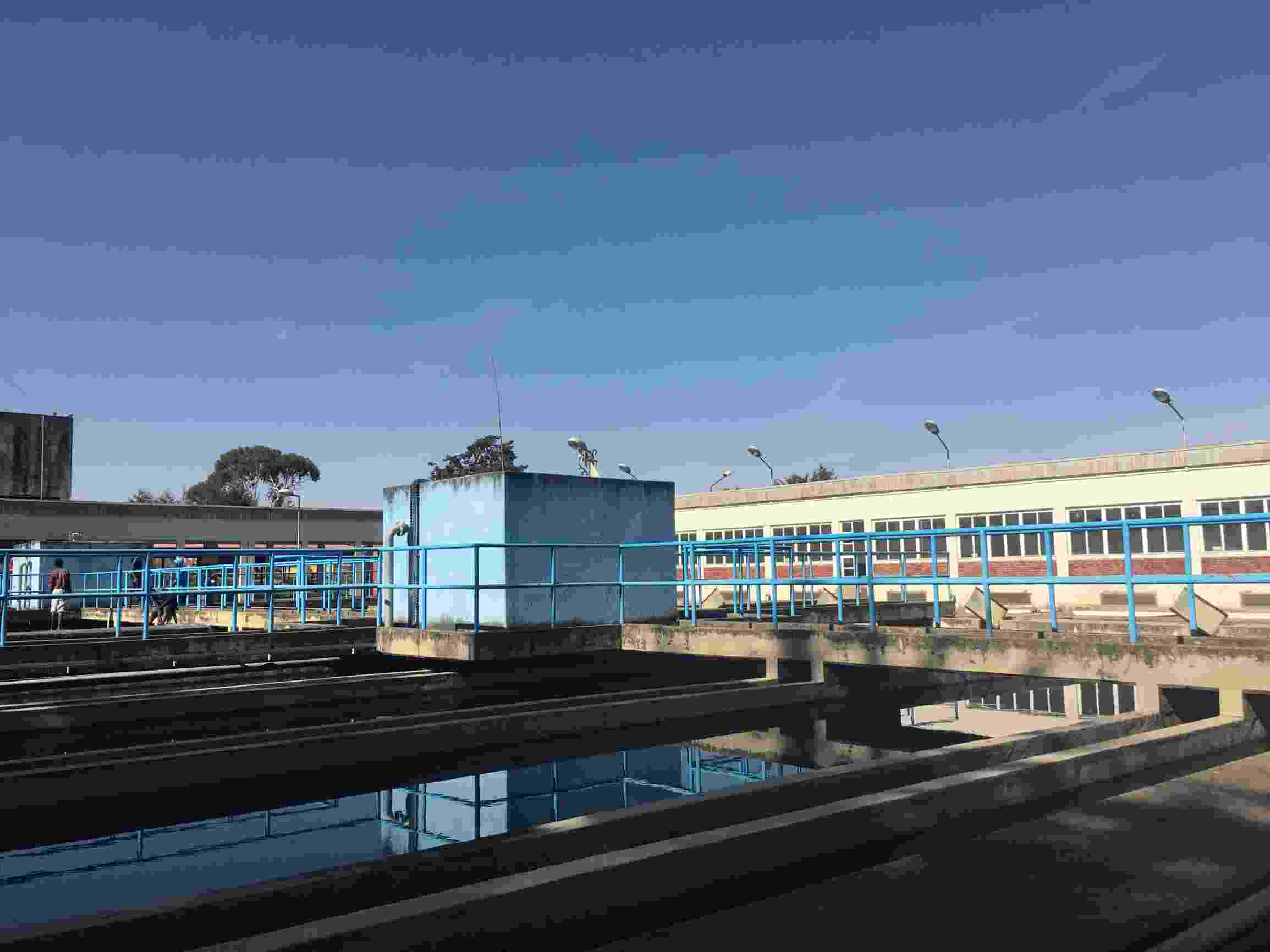 Image shows part of the Legedadi Reservoir, with water tanks and walkways