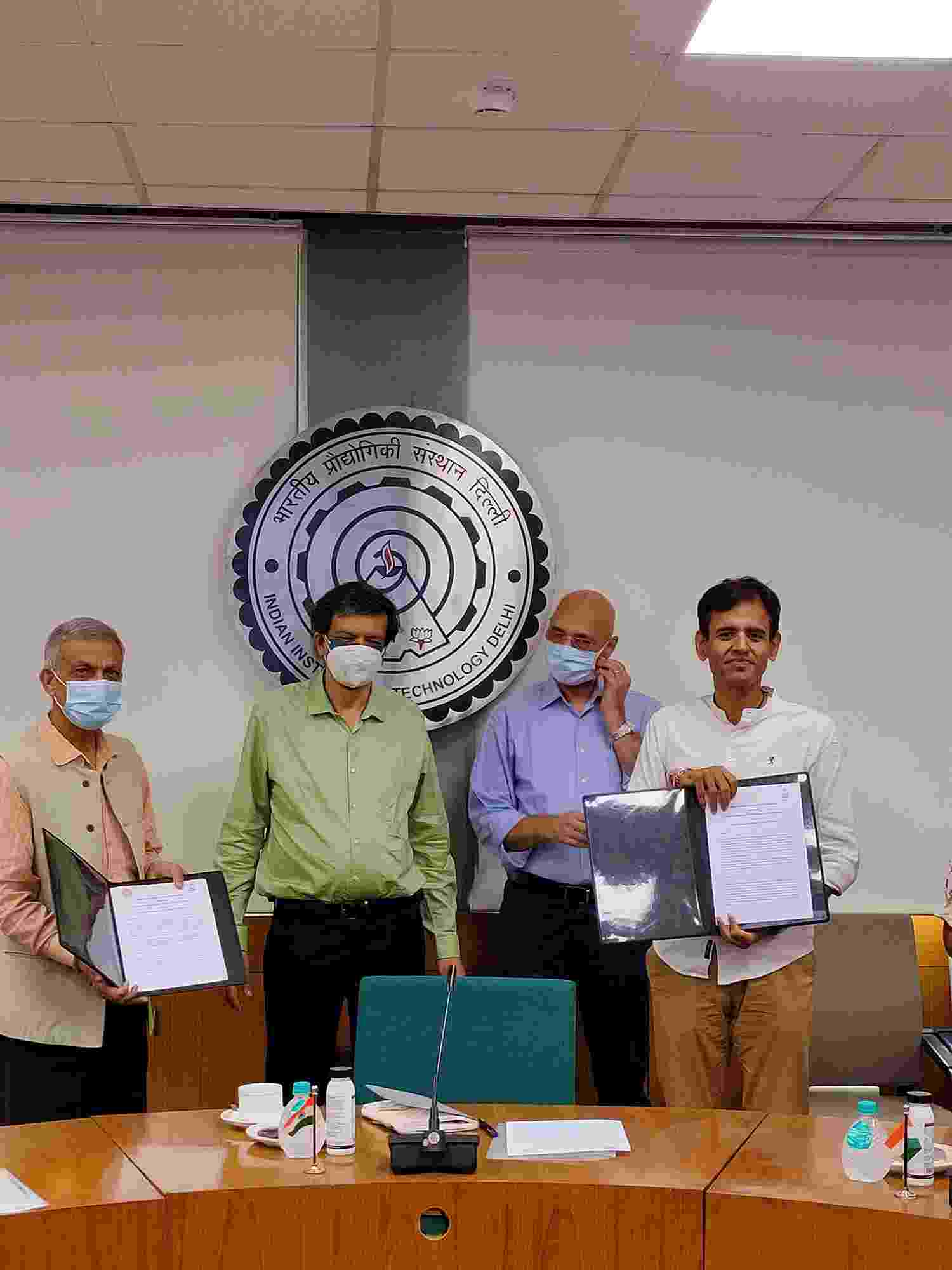 Colleagues and partners signing the MoU in 2022